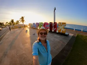 Chris in front of Campeche sign