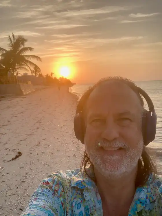 Chris on sunrise beach walk